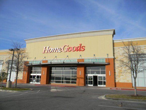 A home goods store with a parking lot in front of it