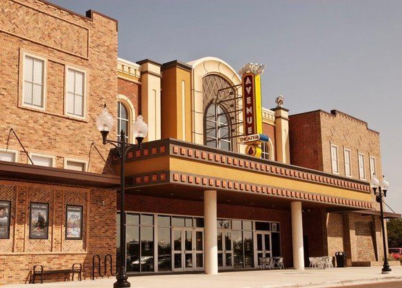 A large building with a sign that says ' avery ' on it