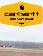 A Carhartt company gear logo is on a yellow sign.