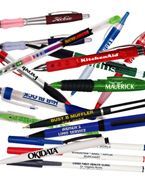 a bunch of pens are sitting on top of each other on a white background .