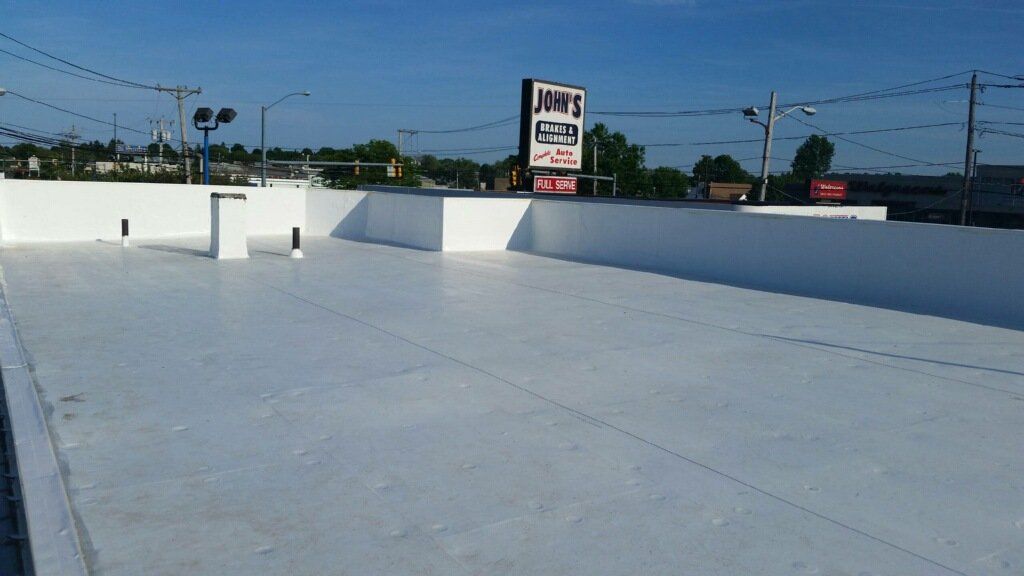 A white roof with a sign that says mary 's on it
