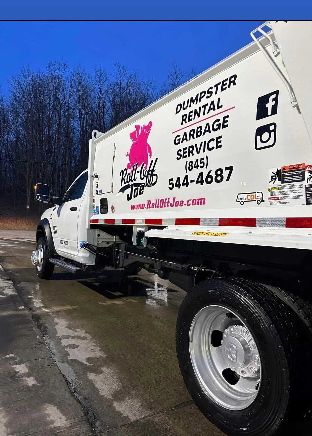 White garbage truck with 
