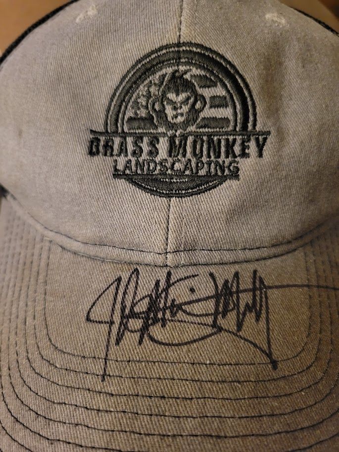 A grey baseball cap with a 