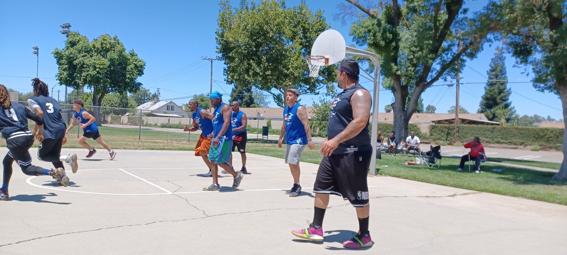 men playing basketball