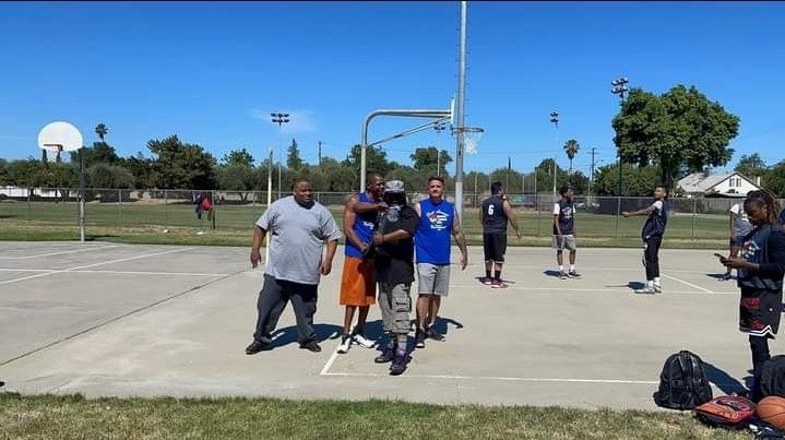 men after playing basketball