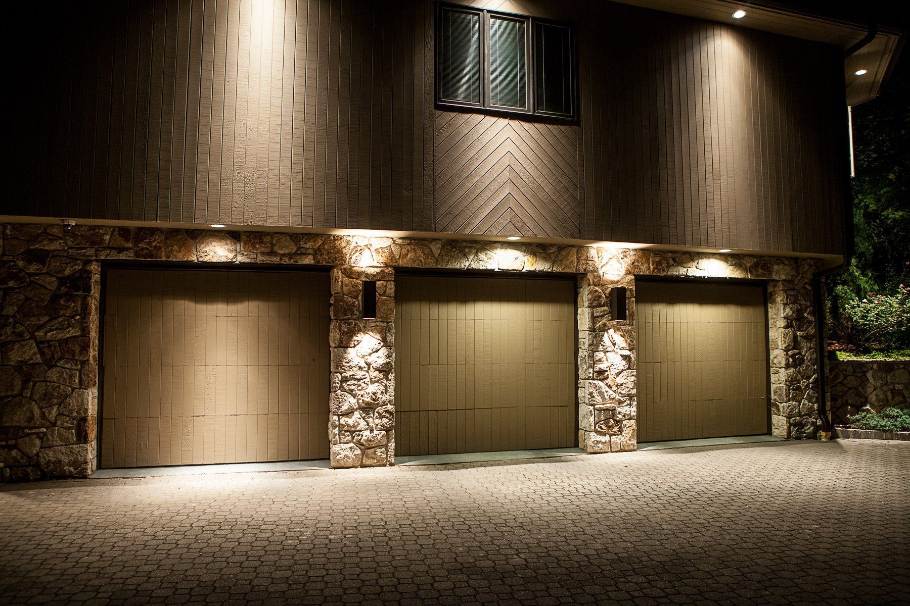 Residential home exterior custom garage lighting