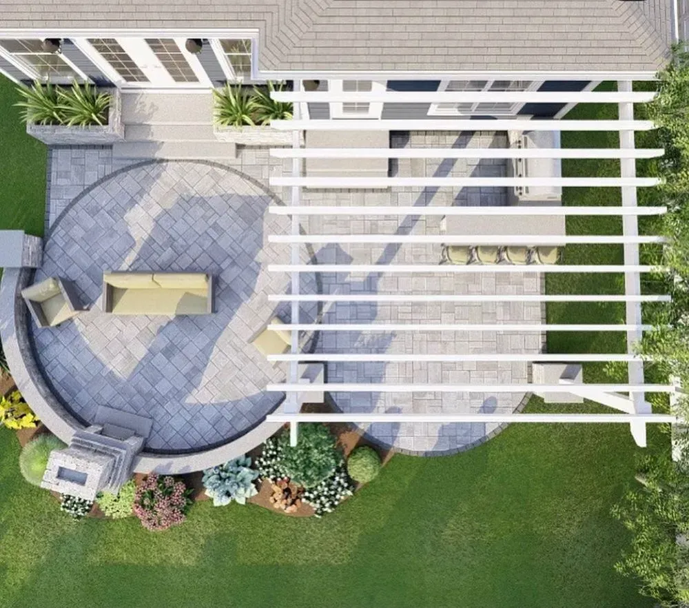 An aerial view of a patio with a pergola and a couch