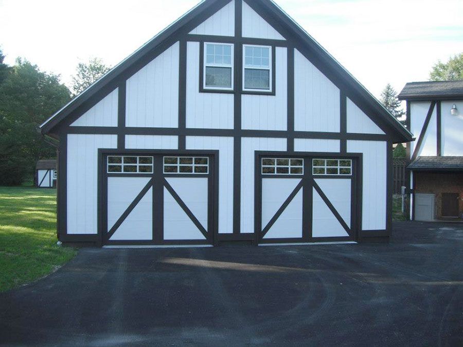 A black and white garage with the letter f on the side