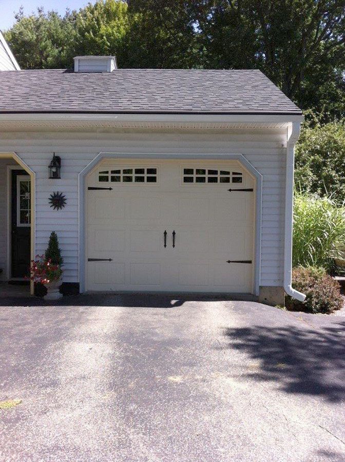 A beautiful house with white garage door