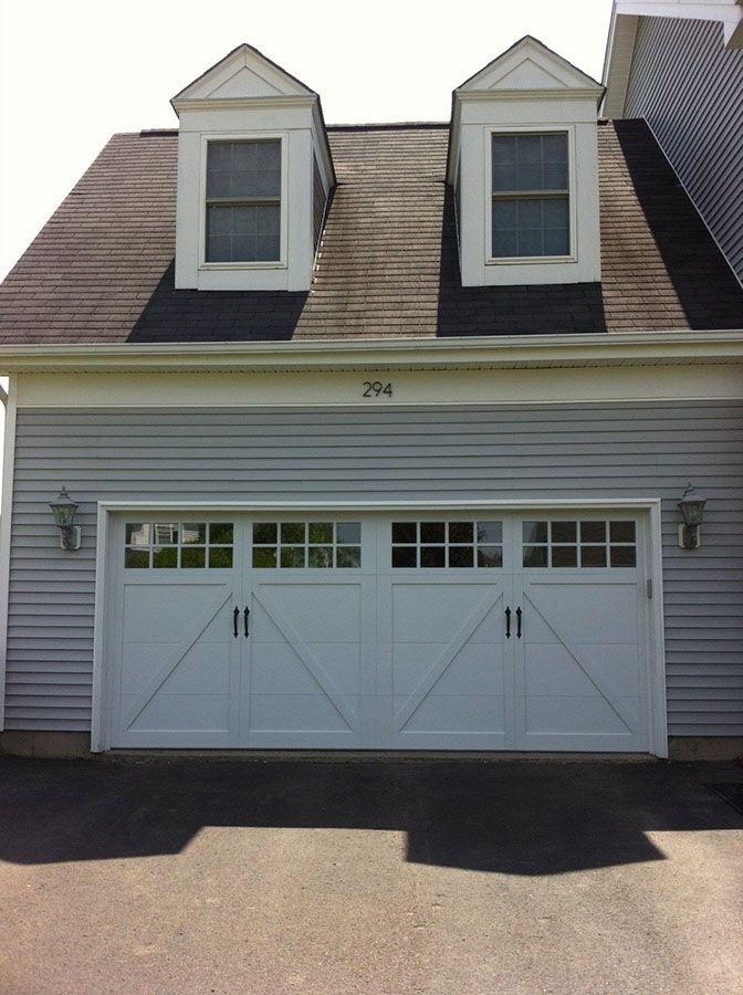 A huge house with white garage door