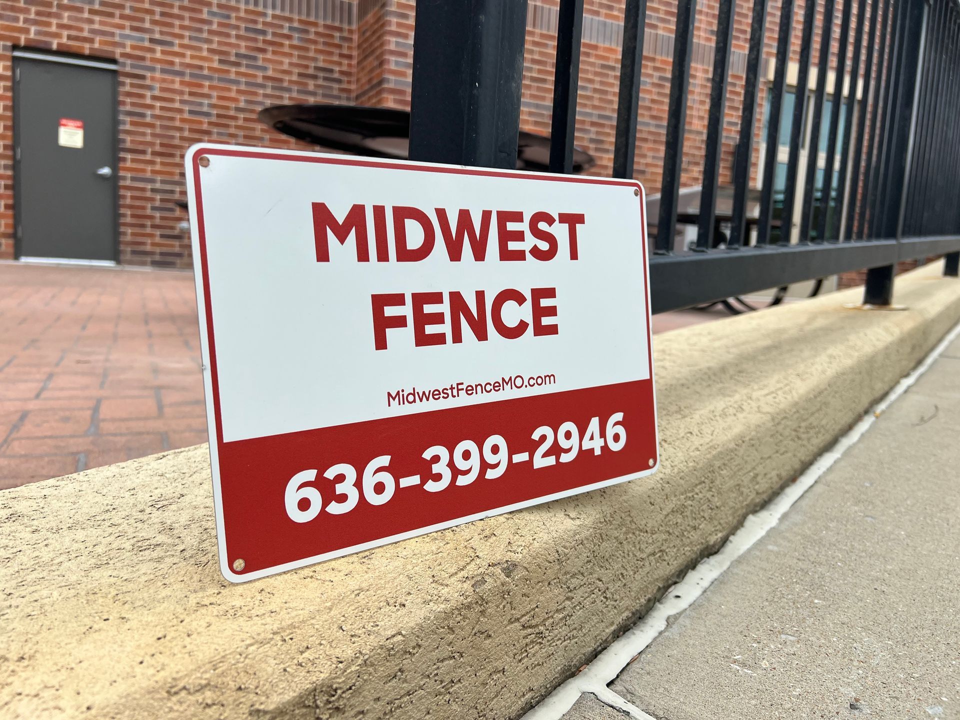 Midwest Fence sign