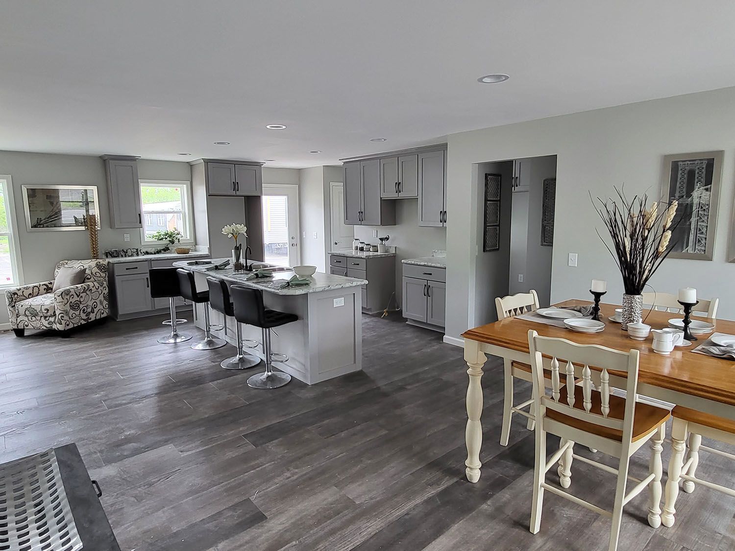 A dining table and chairs in the dining area