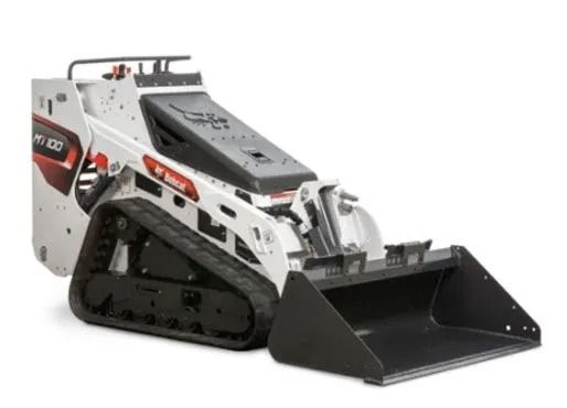 A white Bobcat MT100 stand-on track loader with a black front bucket, viewed from a side angle against a white background.