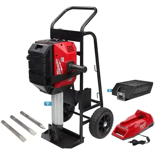 A red Milwaukee electric jackhammer mounted on a cart, with a battery pack, charger, and three chisels to the side.