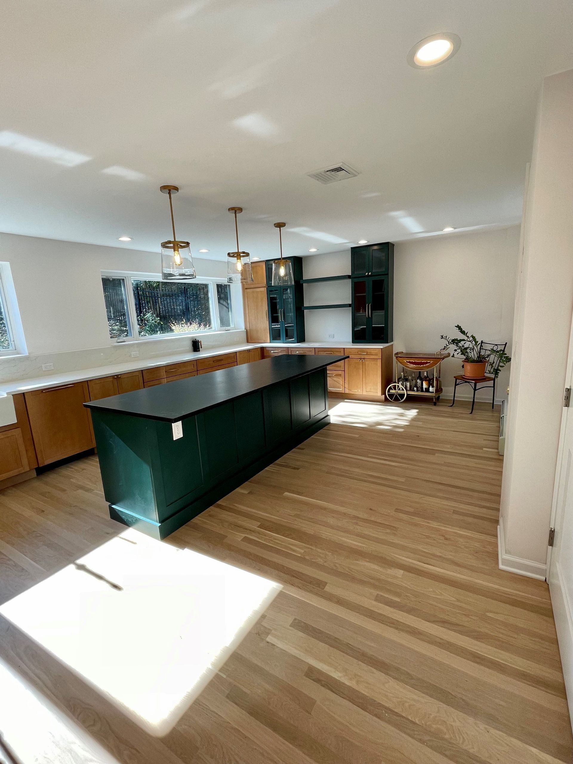 There is a large island in the middle of the kitchen.