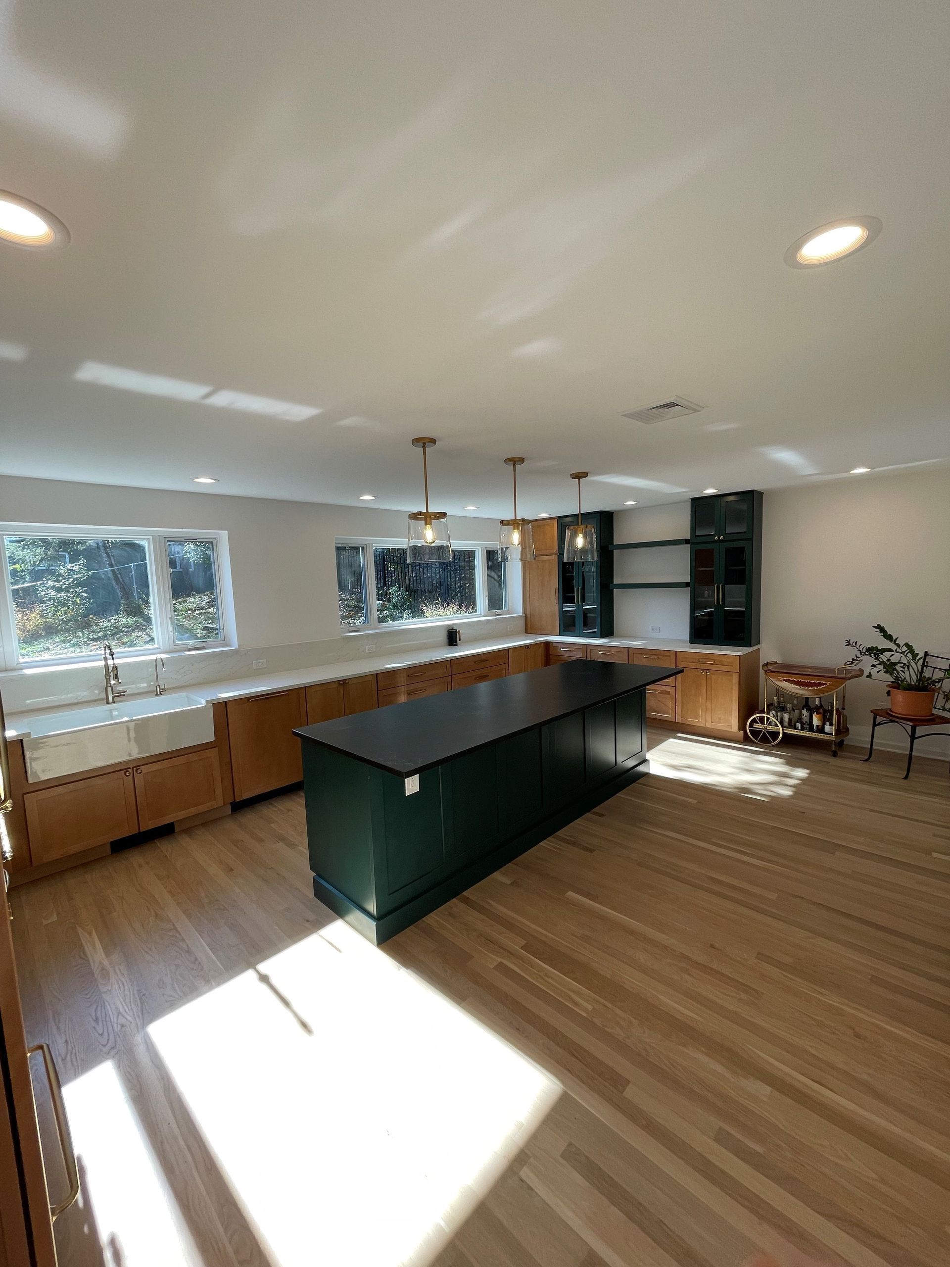 A large island in the middle of the kitchen.