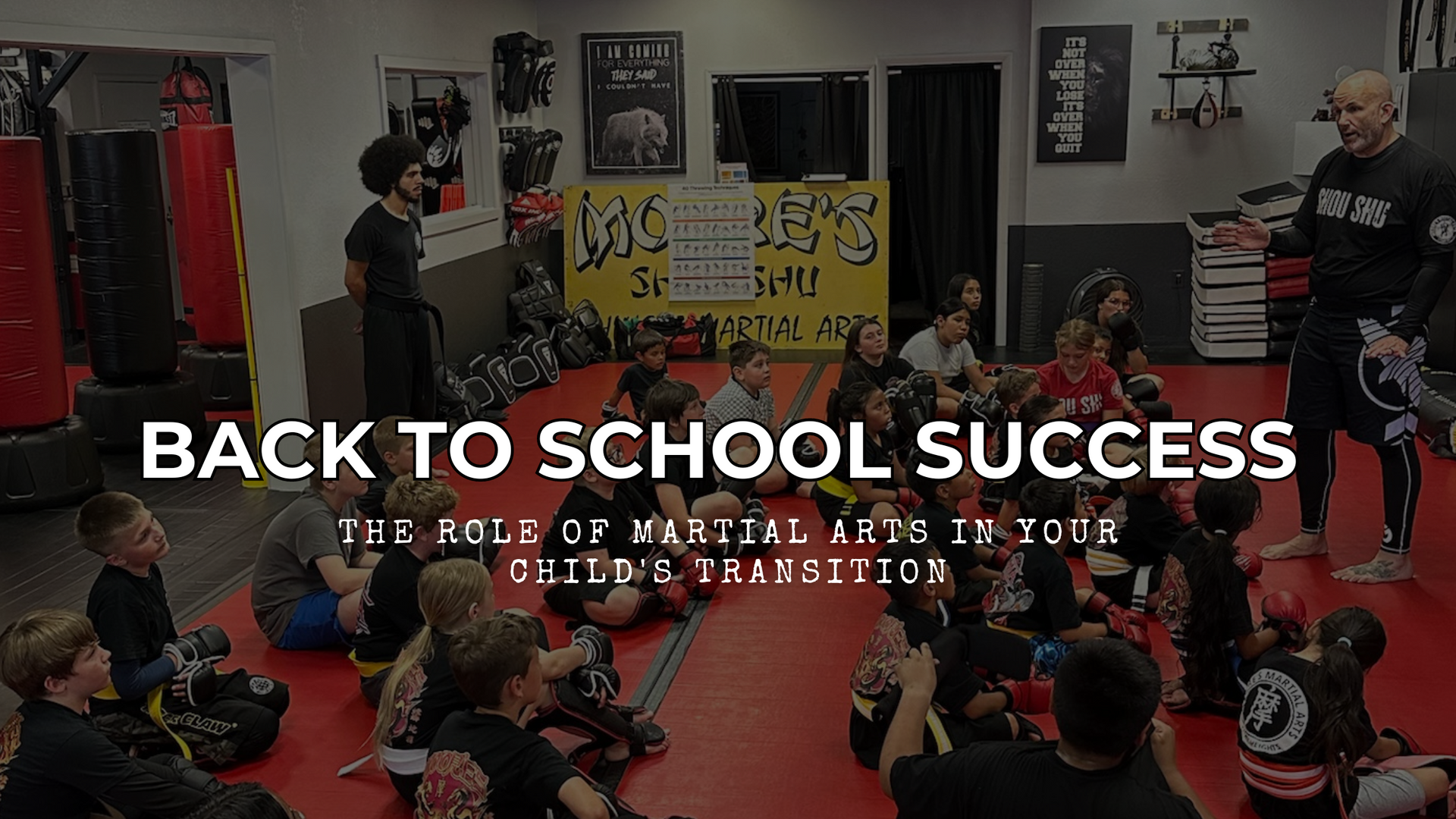 Children practicing martial arts in a bright dojo with supportive instructors
