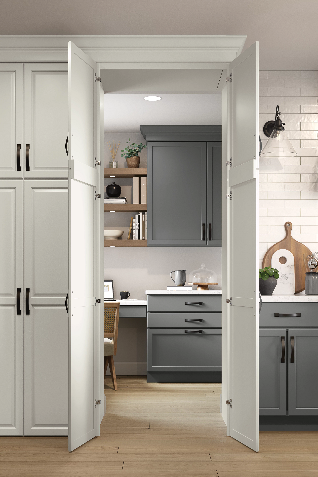 A kitchen with gray cabinets and white cabinets with the doors open.