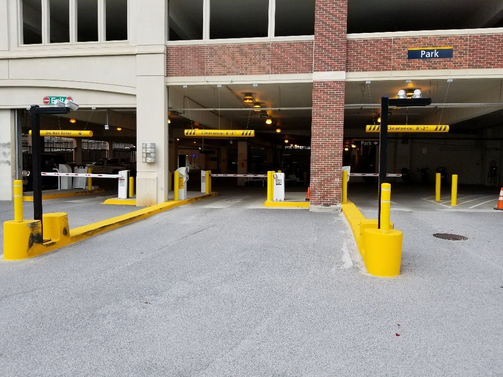 A parking garage with a sign that says park on it