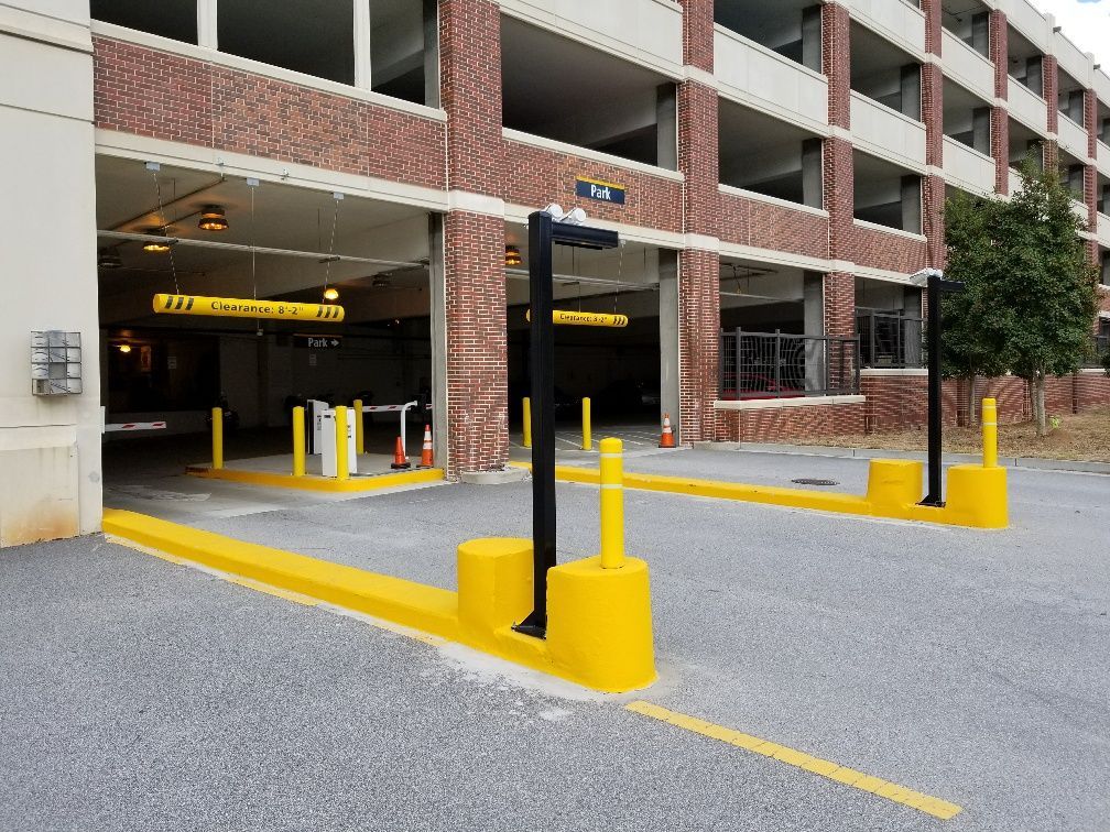 A parking garage with a sign that says exit on it