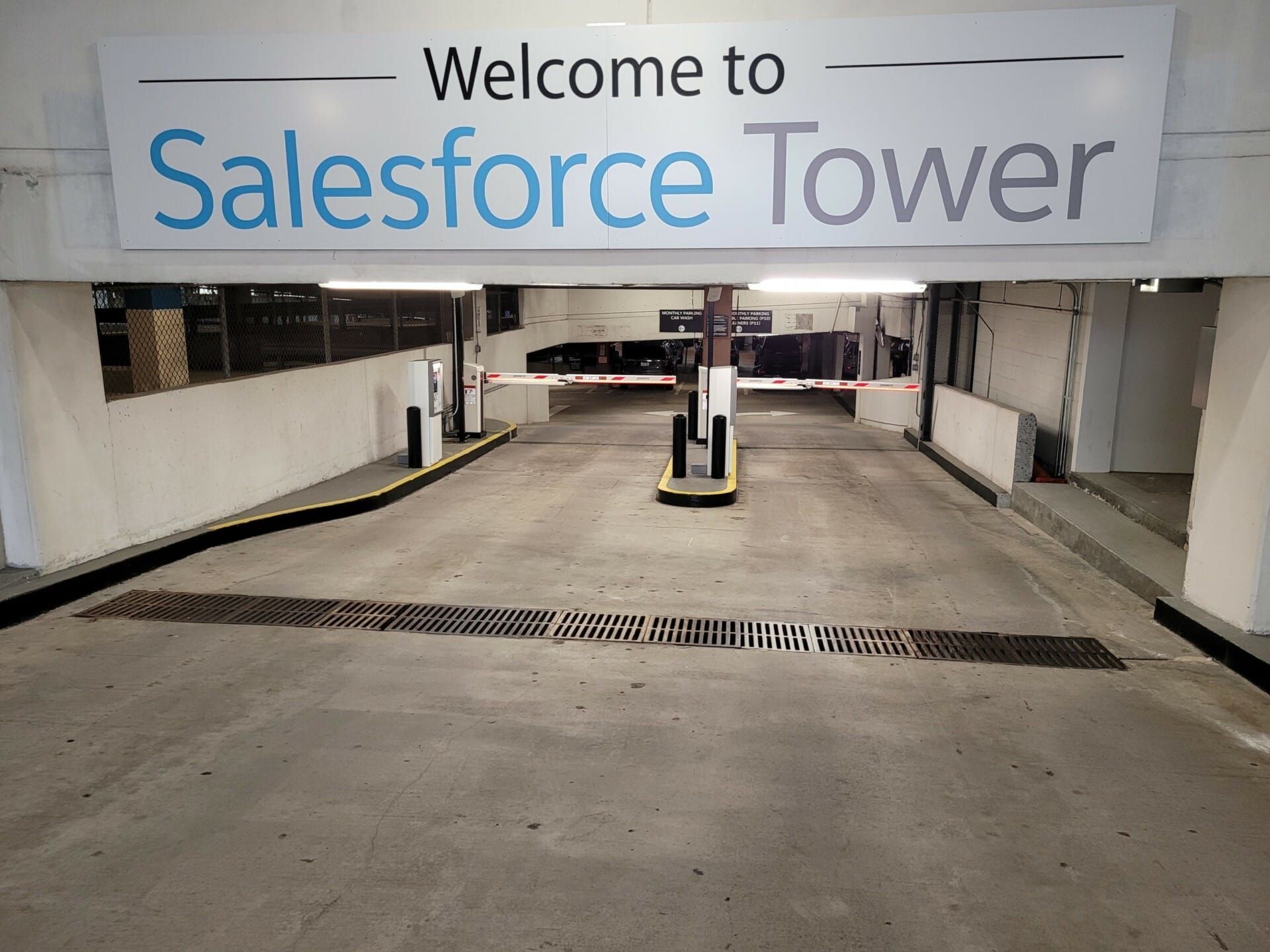 A parking garage with a sign that says welcome to salesforce tower