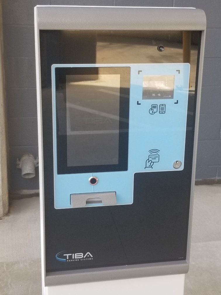 A black and blue machine with the word tiba on it