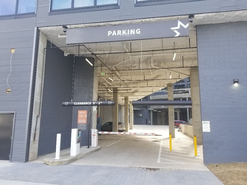 A building with a sign that says parking on it