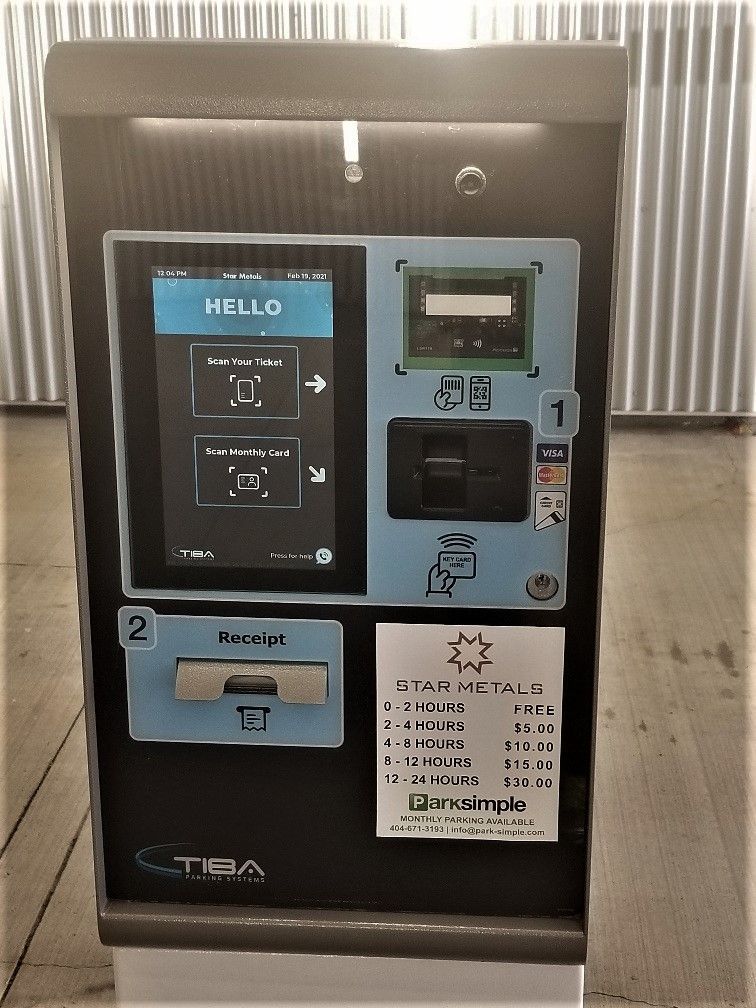 A parking meter that says hello on it
