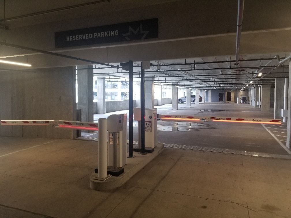 A parking garage with a sign that says reserved parking