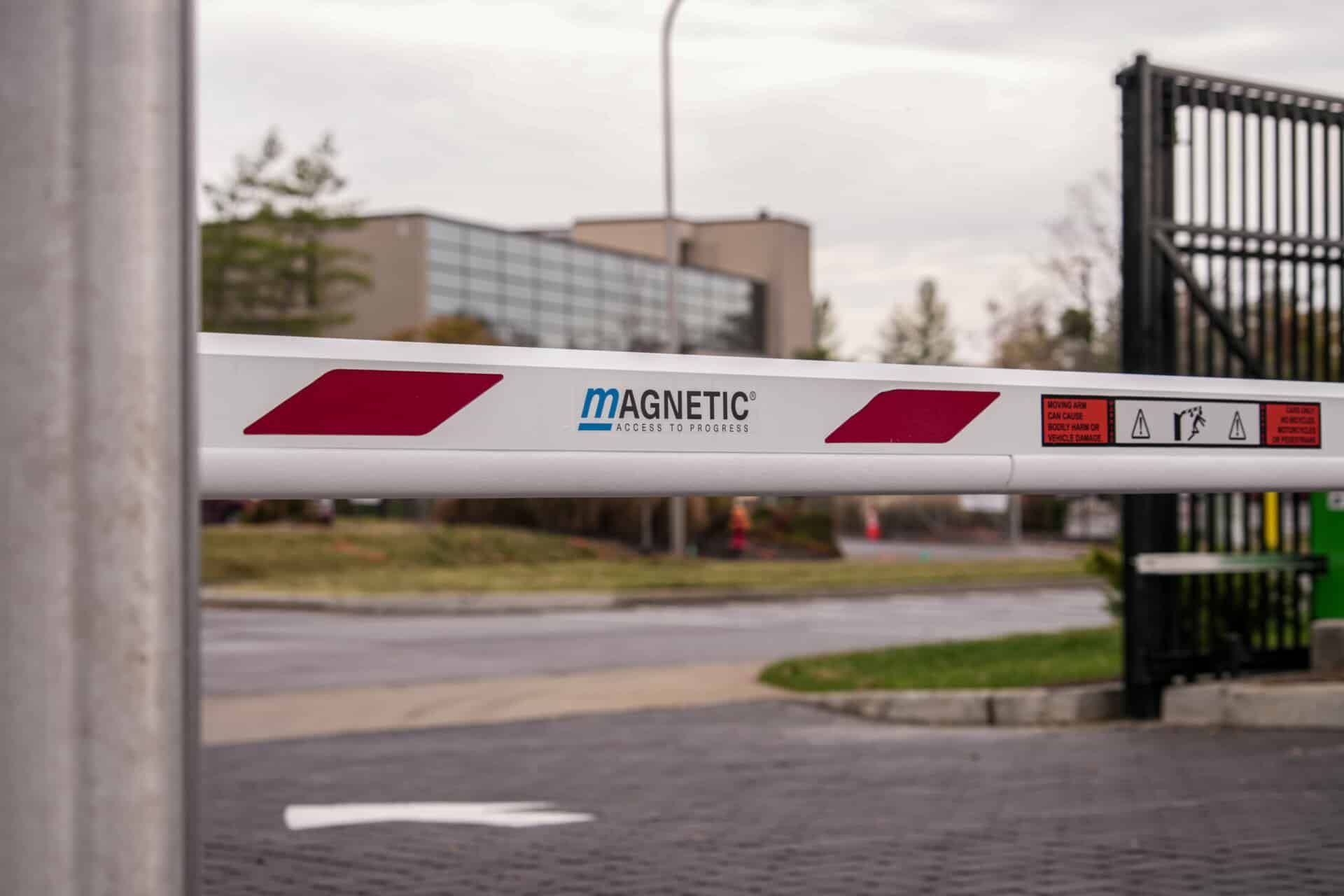 A white and red barrier with the word magnetic on it