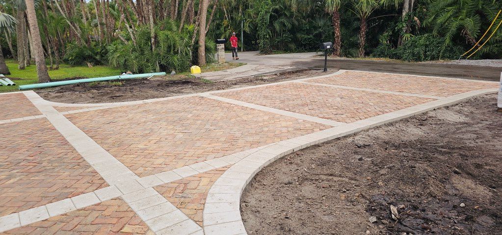 Curved gravel pathways and a sandy play area in a landscaped park garden