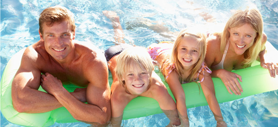 A happy family swimming