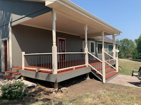 gray house with wide porch