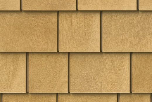 A close up of a wooden shingle roof.