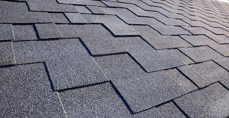 Shingle roofing material