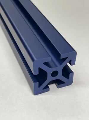 A blue aluminum extrusion with a hole in the middle