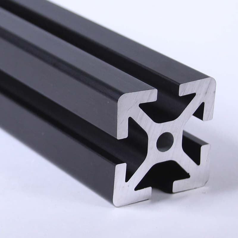 A black metal bar with a hole in the middle