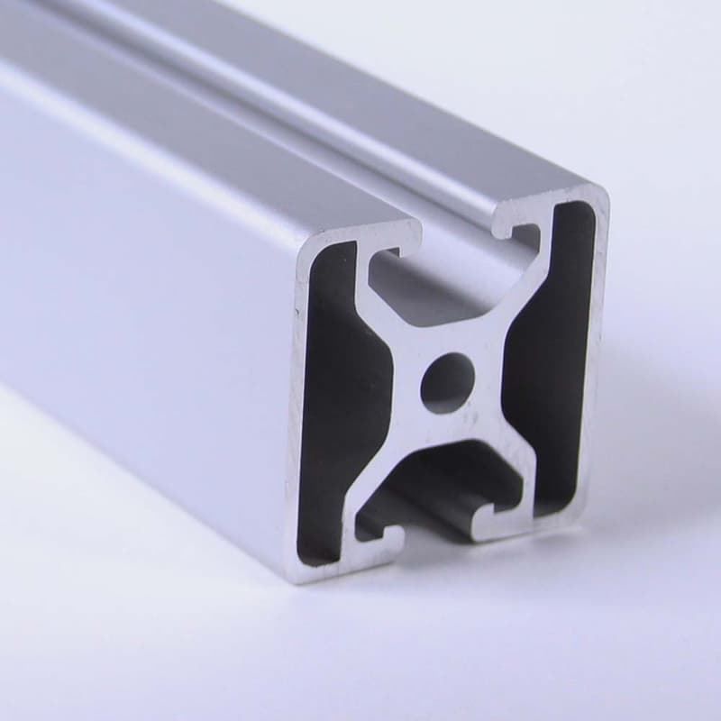 A close up of an aluminum tube with a hole in the middle