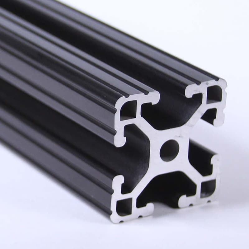 A black aluminum tube with a hole in the middle