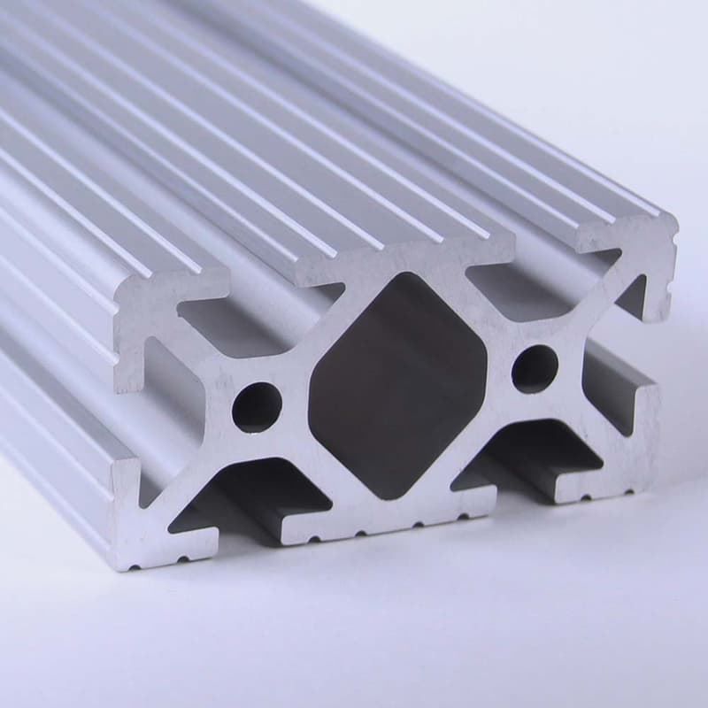 A piece of aluminum with holes in it