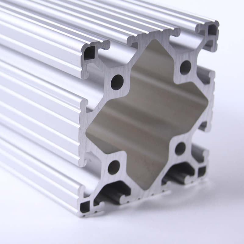 A close up of an aluminum tube on a white surface