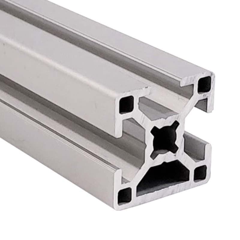 A close up of an aluminum profile on a white background.