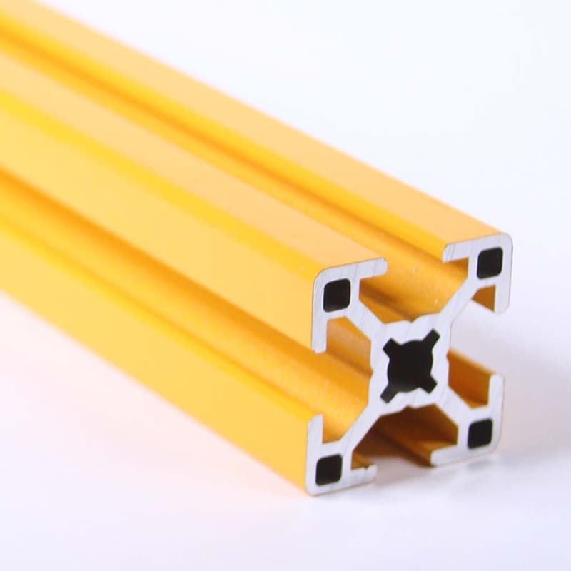 A close up of a yellow aluminum frame on a white surface
