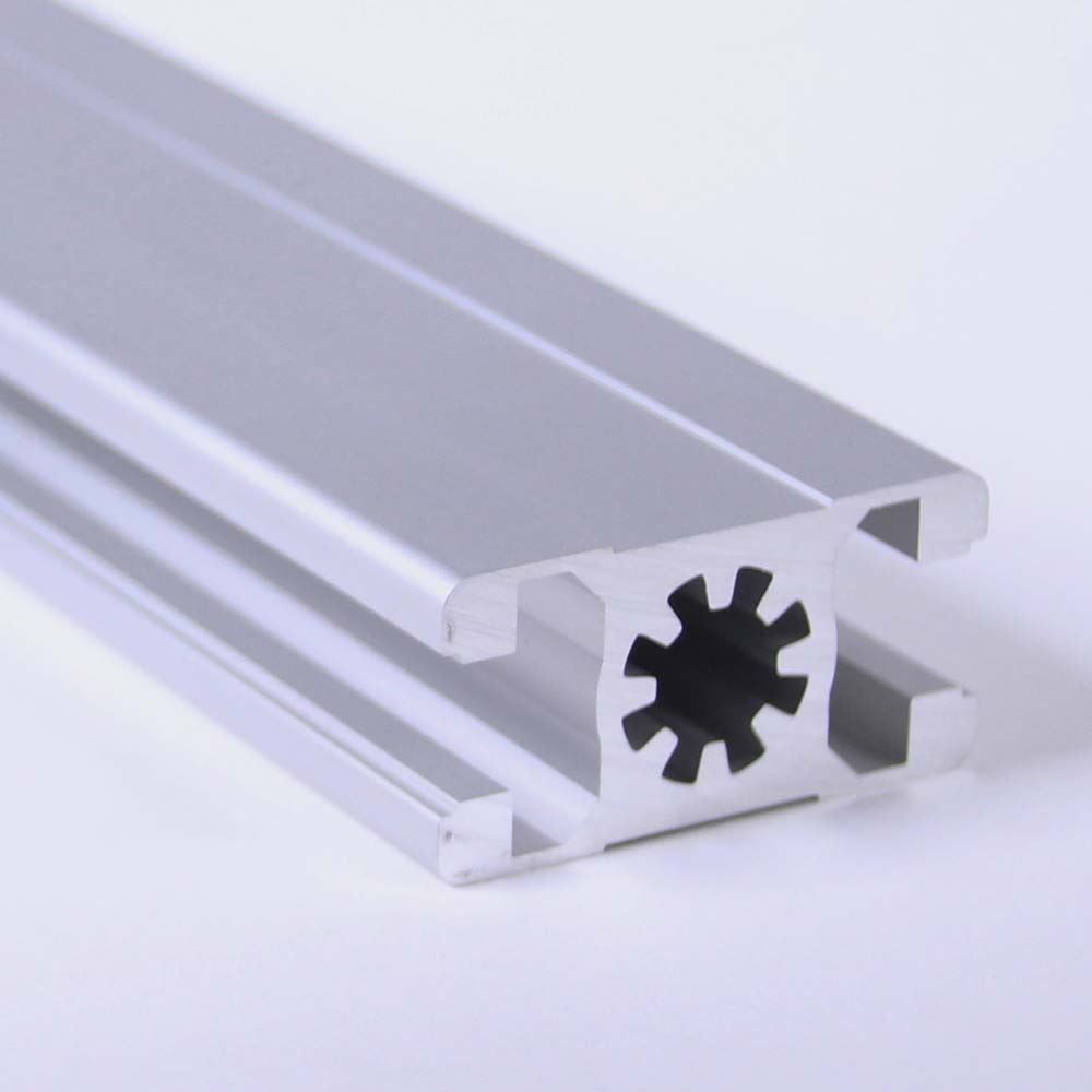 A piece of aluminum with a hole in the middle