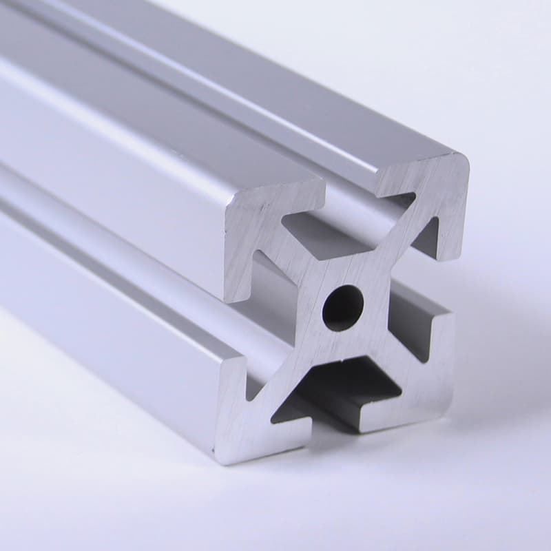 A piece of aluminum with a hole in the middle