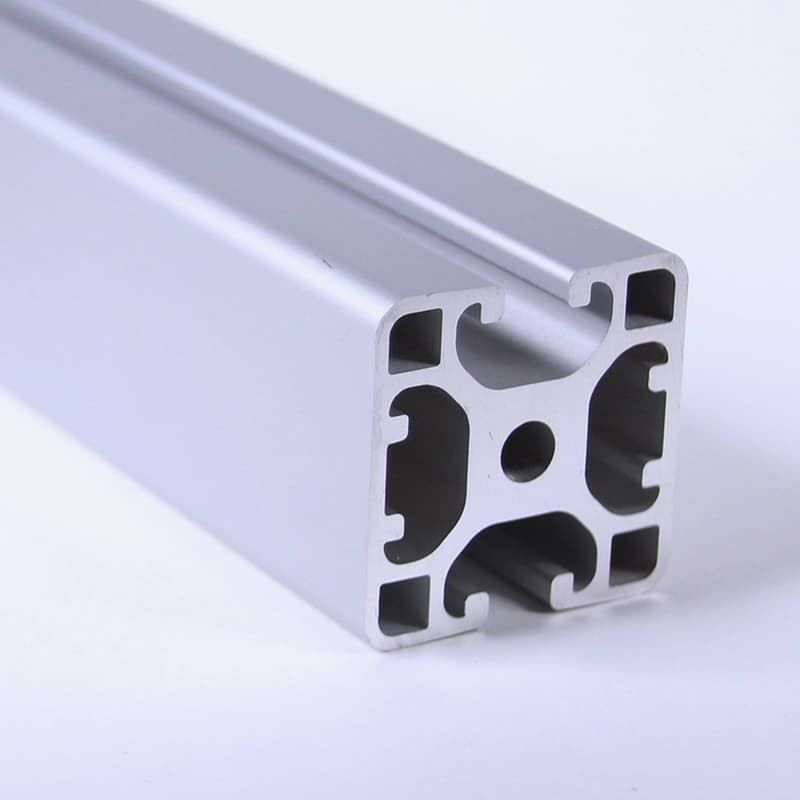 A close up of an aluminum tube on a white surface
