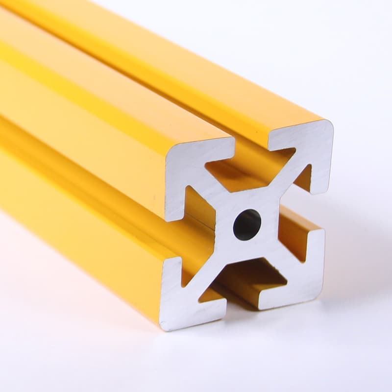 A yellow metal bar with a hole in the middle