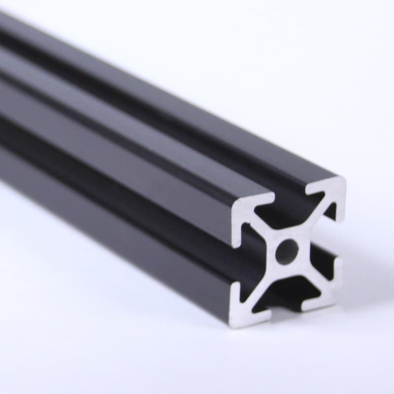 A black aluminum tube with a hole in the middle