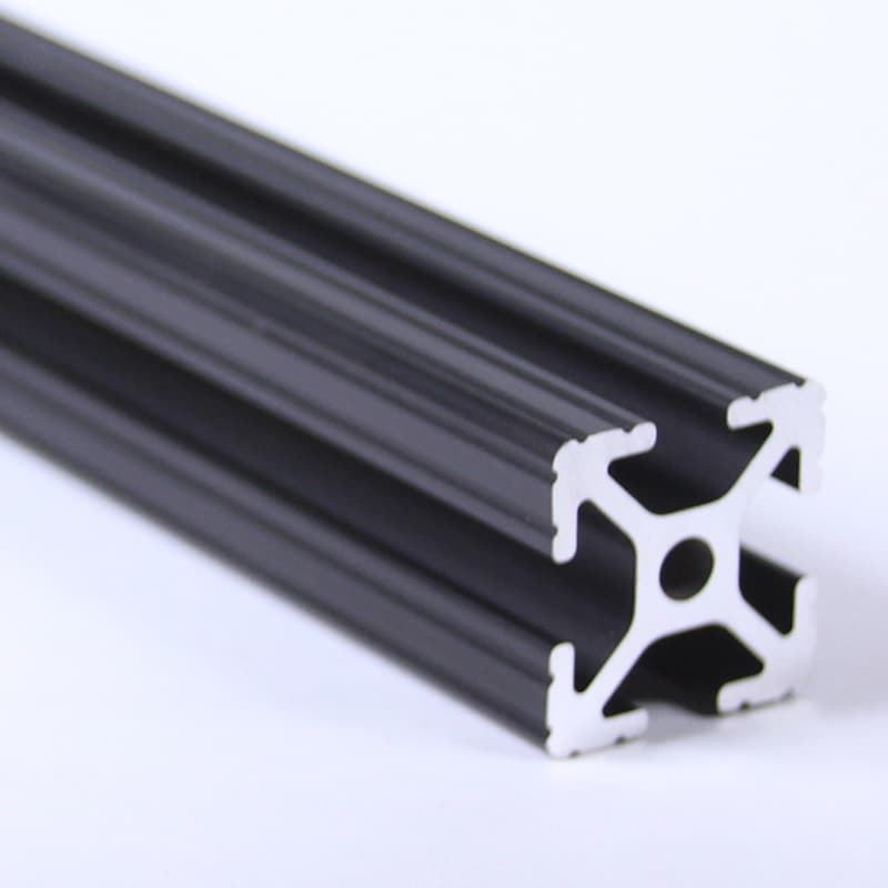 A black aluminum tube with a white x on it
