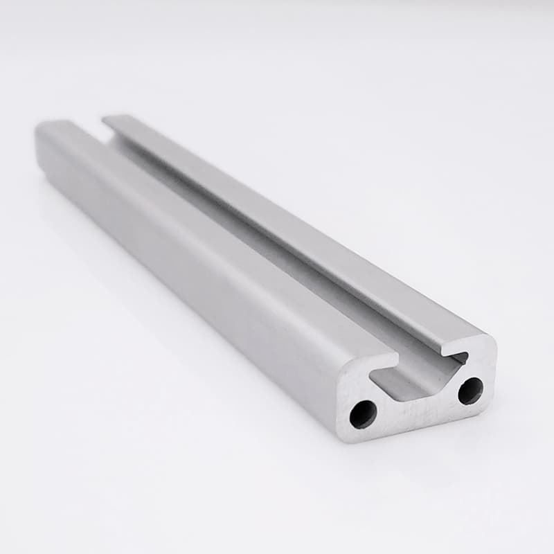 A close up of a metal bar with two holes in it on a white surface.